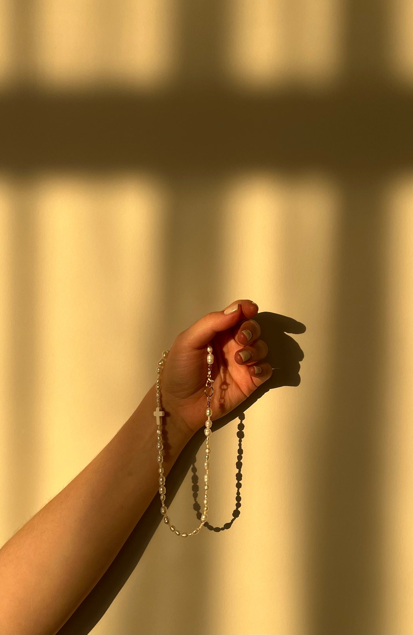Delilah cross necklace.